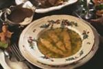 Krutersuppe  - verfeinert mit pochierten Lachs